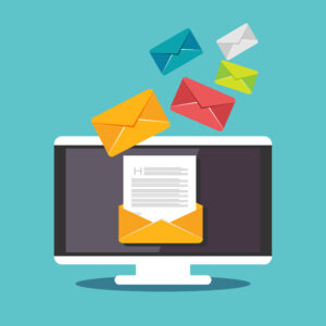 Illustration of a computer screen with an envelope that is open with other envelopes hovering over the screen.
